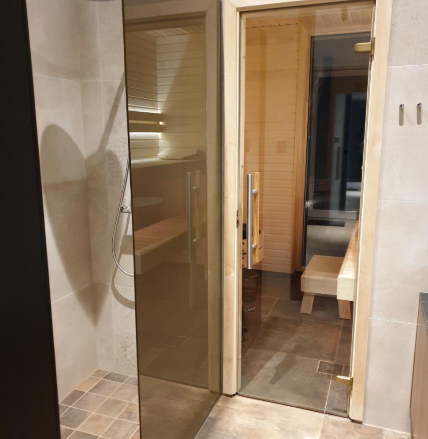 Shower wall with  tinted glass